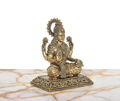 Superfine brass Lakshmi statue, angled view with detailed dress and raised hand