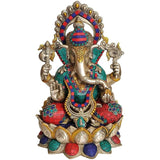 Brass Ganesha idol in kamalasana pose, colorful enamel work on red and blue attire