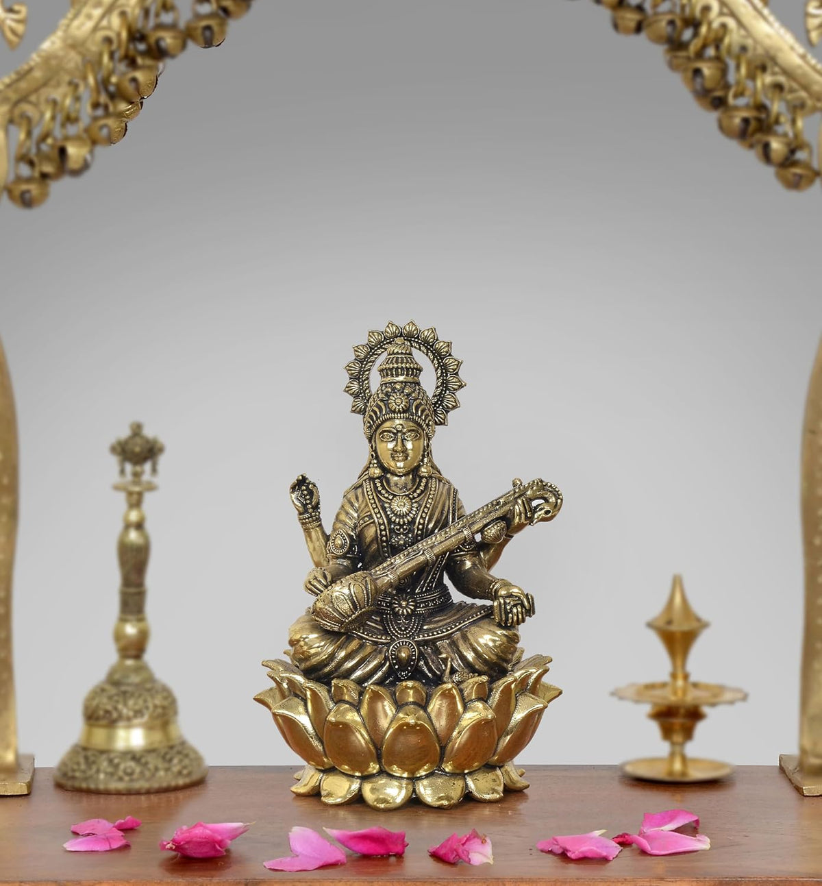 AONA brass Maa Saraswati statue, seated on lotus, holding veena