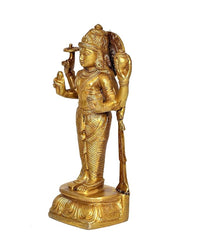Golden brass Dhanvantri idol, side profile, raised staff and ritual object