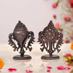 Copper Sanghu and Chakram deity figurines, ornate back and front design on small bases