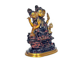 Brass Dattatreya idol with three heads, seated posture, raised arms, gold base