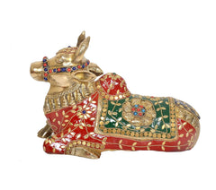 Brass Nandi statue angled view, red torso with green floral motifs and beads