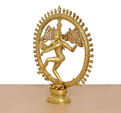 Golden brass Natraj Lord Shiva dancing idol, side profile with raised arms and halo ring