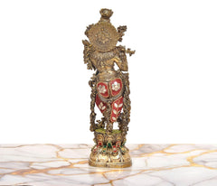 Lord Krishna brass sculpture, back view with decorative circular plaque and jeweled panels.