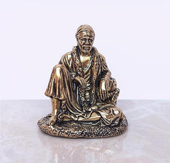 Shirdi Sai Baba brass statue, seated pose with draped robe and prayer hands