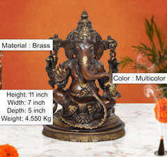 11-inch Brass Ganpati Bappa murti, seated four-armed deity with gold accents