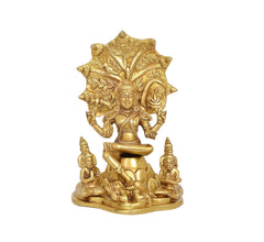 Brass Dakshinamurti Shiva statue, front view, seated with detailed halo and small figures