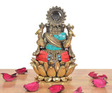 Ganapati Bappa brass idol back view of crown and torso, red lower cloth, blue accent