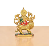 Back view of brass Durga Maa on lion, green and red garments with painted accents
