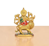 Back view of brass Durga Maa on lion, green and red garments with painted accents