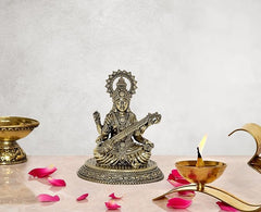 Brass Saraswati idol statue, seated with veena and ornate halo, ~4.5 inch