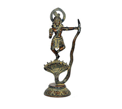 Brass Krishna dancing statue on Kaliya serpent with arched halo, full view