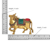 Brass Kamdhenu cow statue, multicolour front detail, height 4 inch shown with ruler
