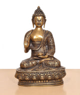 Brass Abhaya mudra Buddha idol from front view, textured robe patterns and base