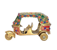 Brass auto rickshaw showpiece with jeweled blue/red trim and side wheels