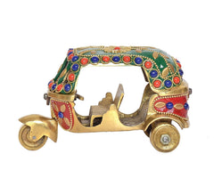 Brass auto rickshaw showpiece with jeweled blue/red trim and side wheels