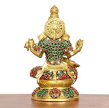 Brass Saraswati statue back view, jeweled bodice and crown, veena in hands