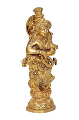 Brass Radha Rani figurine in profile with halo-like back and ornate jewelry, golden