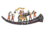 Iron wall showpiece on curved dark base with central rider and surrounding musicians