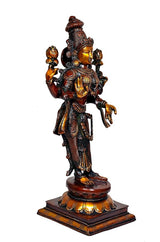 Stehendes Lakshmi-Messingidol seitlich, goldene Gesichtspartie und verzierte Gewänder