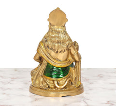 Brass Hanuman JI statue, back view on circular base with sculpted drapery