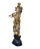 Brass Krishna murti, side view with flute raised, detailed jewelry, dark pedestal, 29 in.