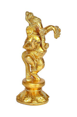 Brass Dancing Ganesha decor idol, golden finish, angled view, round pedestal