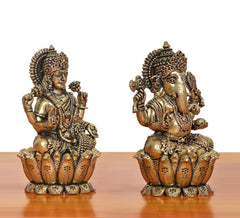 Bronze Lakshmi (left) and Ganesha (right) statues, angled seated poses