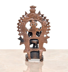 Copper Lord Krishna figurine with cow motif, rear view