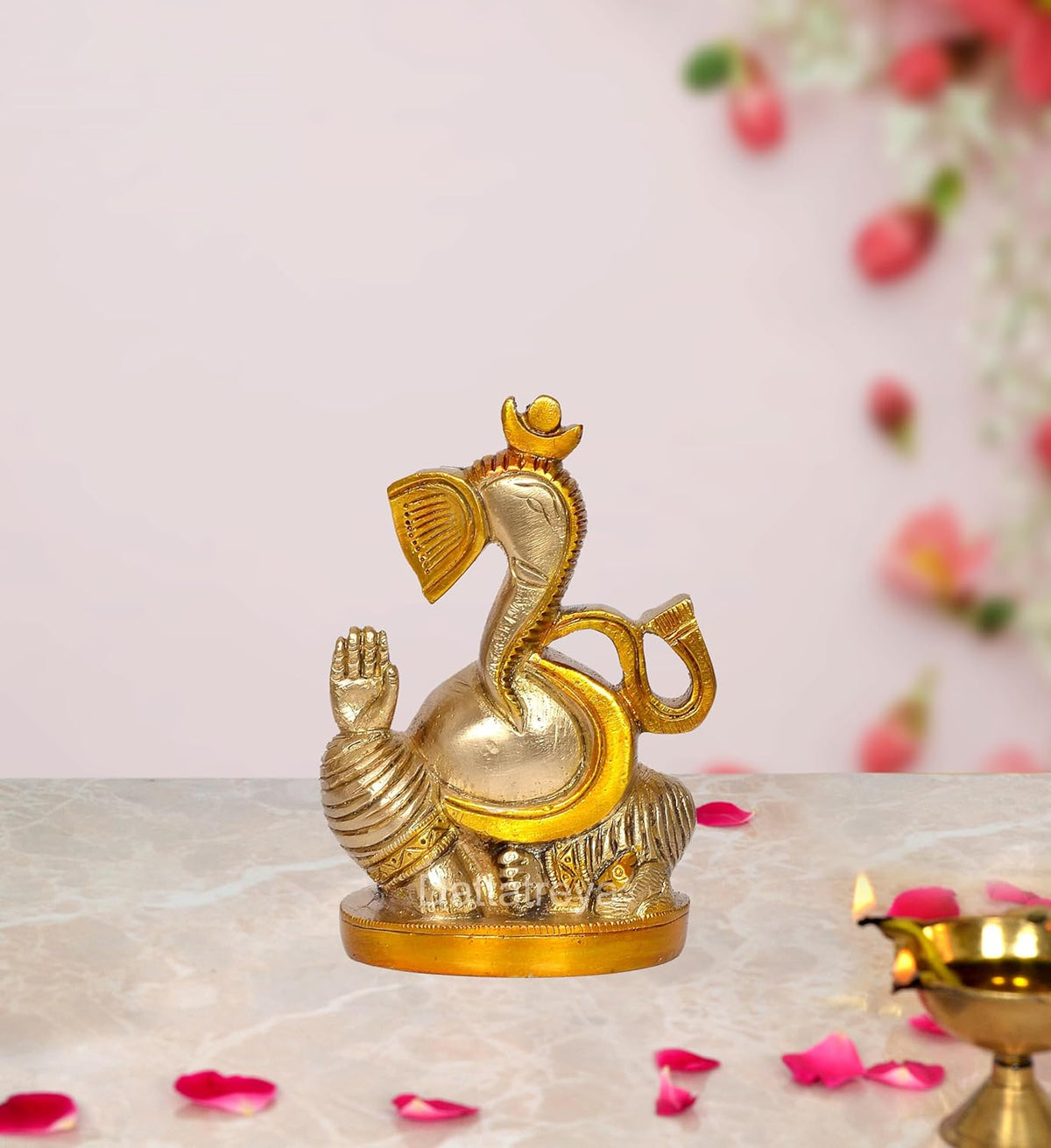 Brass Lord Ganesha figurine, raised hand, gold crown details
