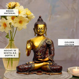 Seated brass Buddha idol with blessing hand raised, golden color, 10 in height