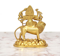 Durga Maa brass statue on lion, golden finish, close rear view of base