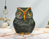 Brass owl table decor with green textured body, gold eyes and beak detail
