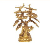 Golden brass Buddha tree idol, ornate branch with birds above seated figure
