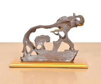Resin elephant and baby elephant figurine, front view on gold base