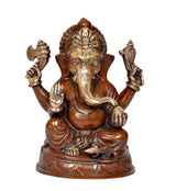 Ganesha idol statue, frontal view with detailed crown, seated with two raised hands