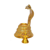 Brass Shiv linga with seven-headed serpent, side view with raised hood