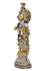 Brass Radha Krishna idol side view, standing pose, blue sash and gold ornaments