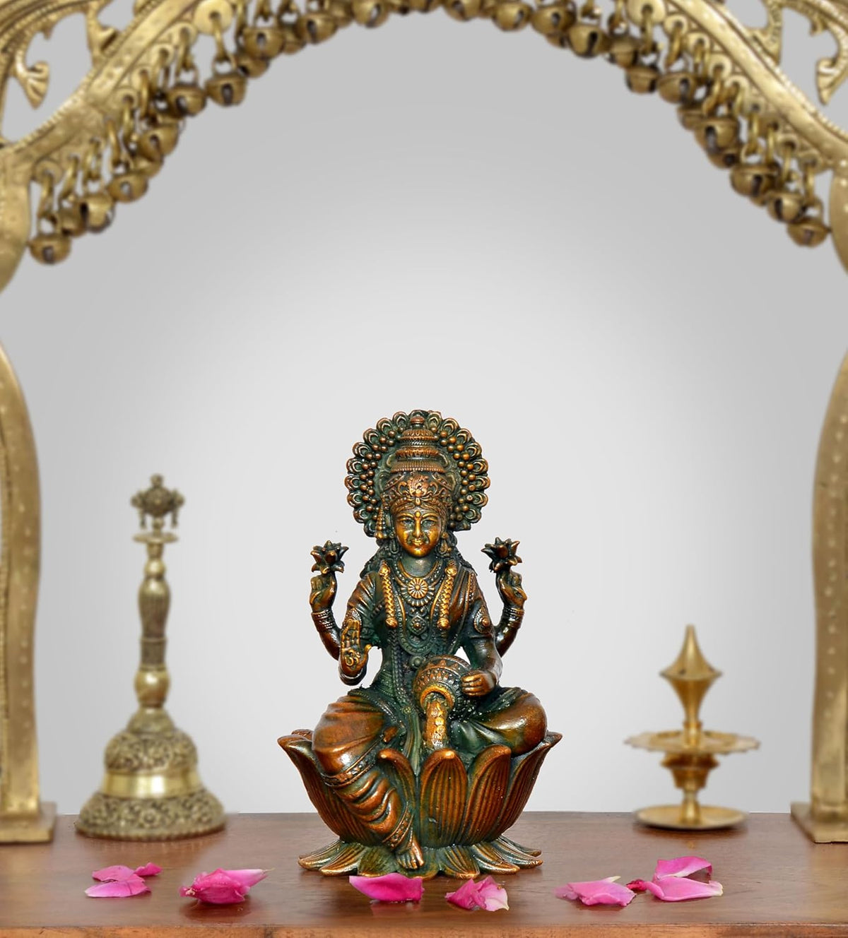 4-inch brass Lakshmi idol, seated on lotus base with ornate teal-green detailing