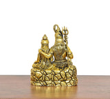 Golden brass Shiva and Parvati idol, back/side view, textured lotus base