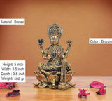 Brass Lakshmi on lotus, front view; bronze tone; 5 inch height