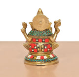 Brass Ganpati Bappa murti (6 inch) back view, jeweled halo and patterned skirt border