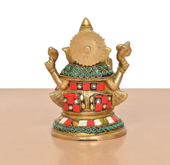 Brass Ganpati Bappa murti (6 inch) back view, jeweled halo and patterned skirt border