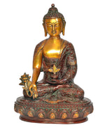 Goldene Buddha-Statue im Lotussitz mit Dhyan-Mudra und grüner/roter Verzierung