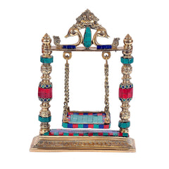 Gold brass Krishna jhula idol with turquoise/red bead columns and blue seat