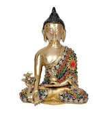 Brass seated Buddha statue with jeweled robe pattern and star-emblem hand