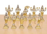 Golden brass Dashavatara figurines in a row, holding spears and umbrella pose
