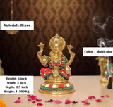 Brass Lakshmi Ganesh statue, multicolor beaded crown and red robe, seated with arms raised