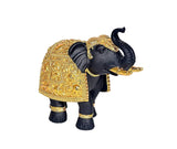 Side view of dark resin elephant showpiece with gold ornate armor-style covering